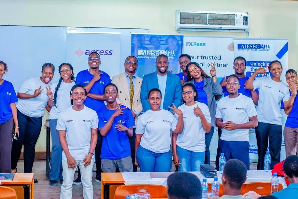 Valence Mwigani with the Youth Financial Literacy programme team